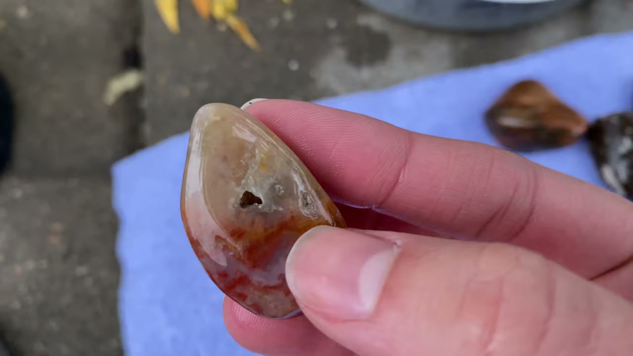 Beautiful polished agate stones after completing all four rock tumbling stages