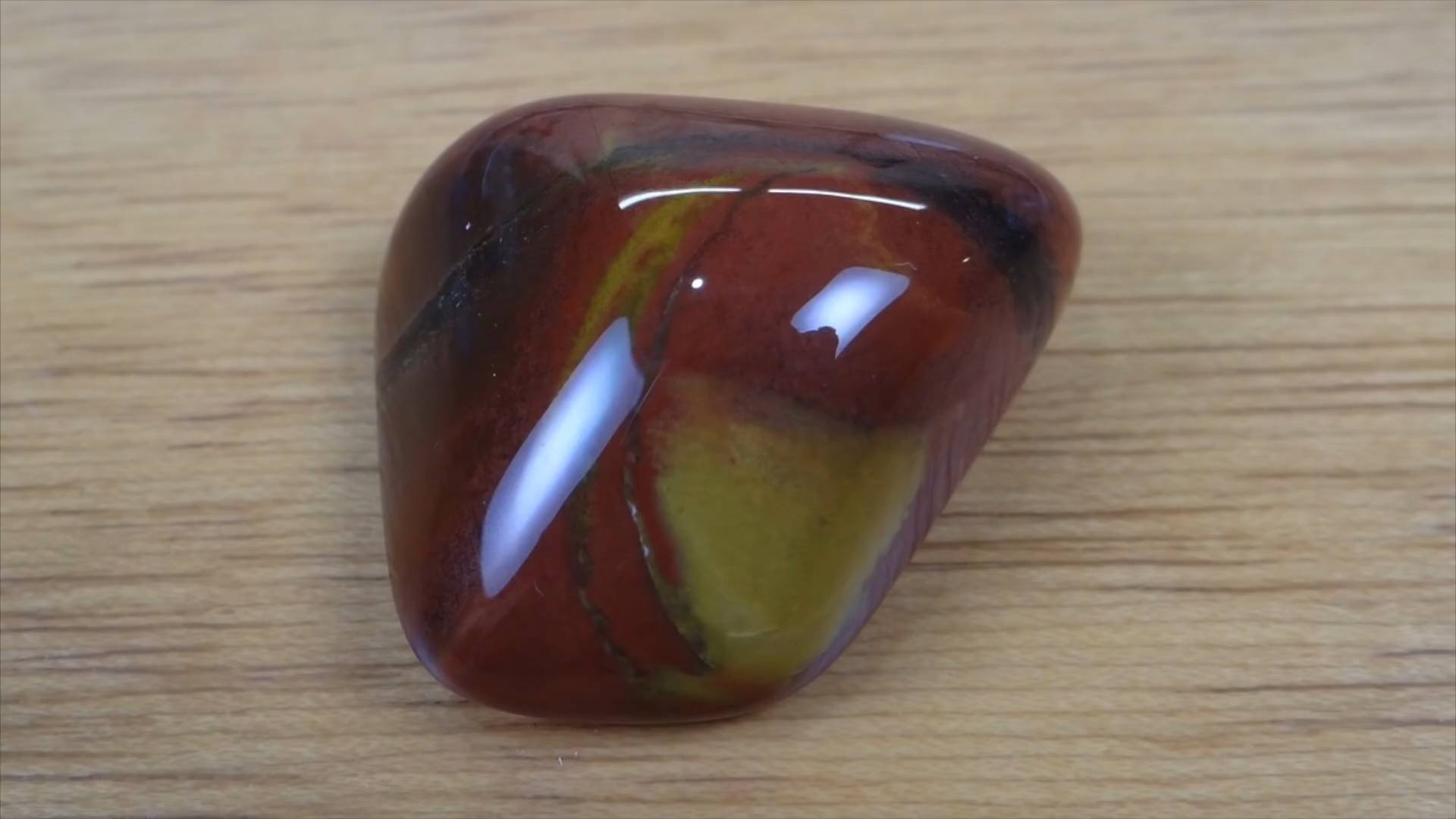 Amber-toned polished stone