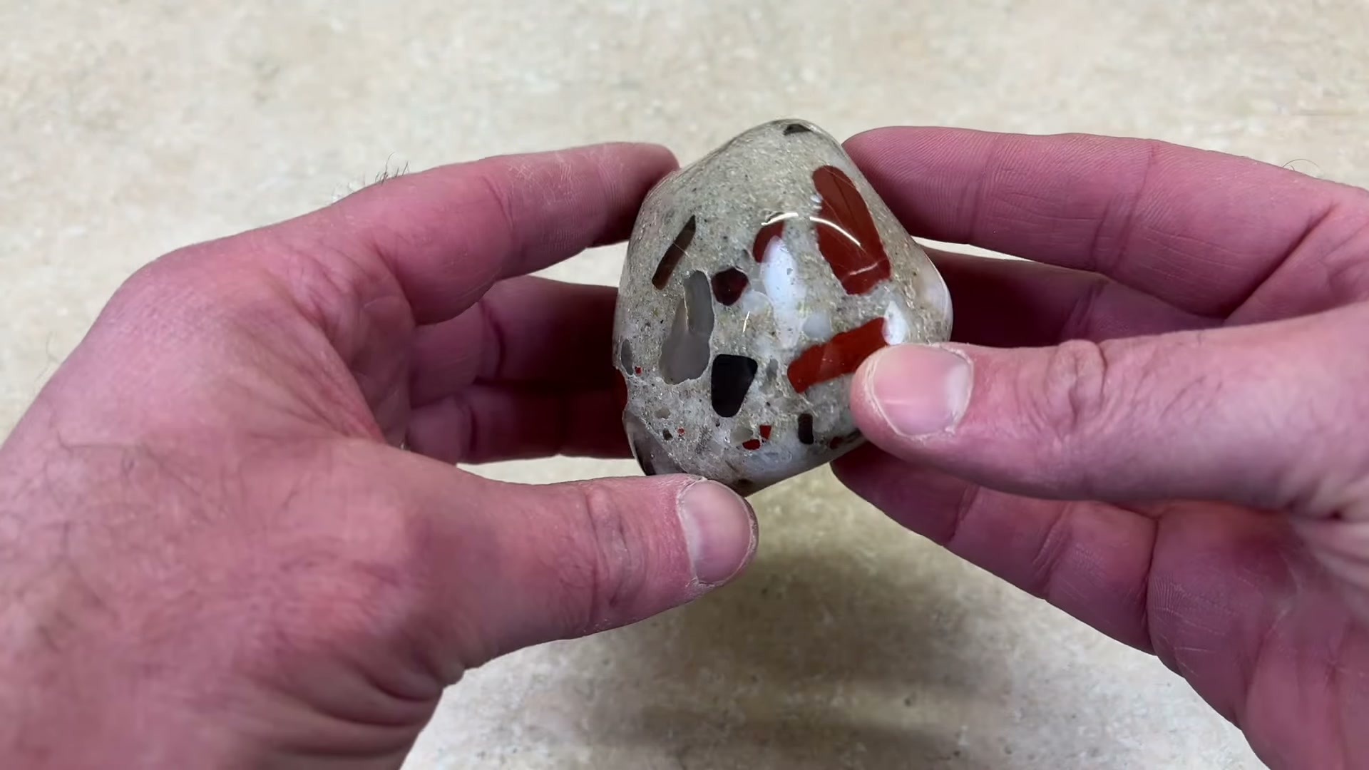 Polished tumbled puddingstone showing beautiful results from rock tumbling